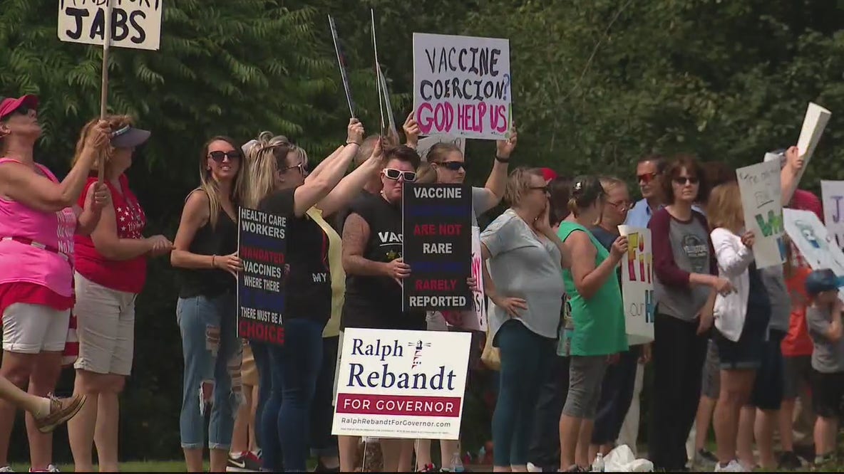 Hundreds of people protest outside of Henry Ford Hospital against vaccine requirements